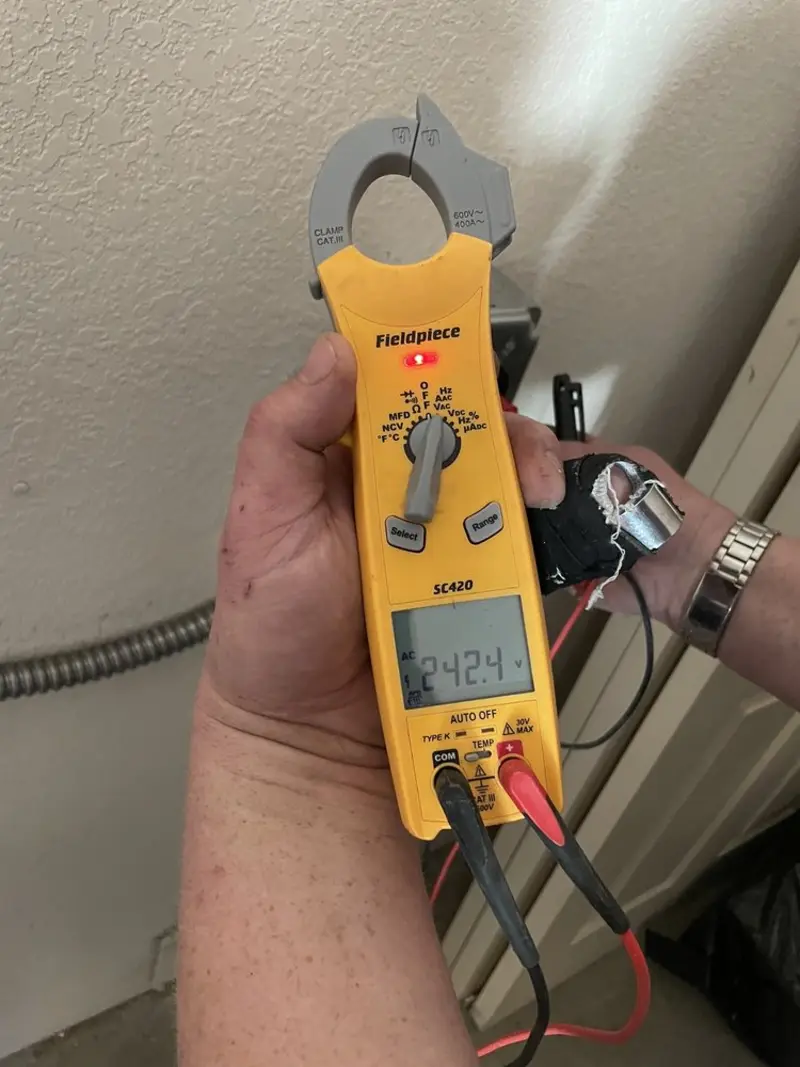 Voltage testing with clamp meter during Generator Installation in Frisco